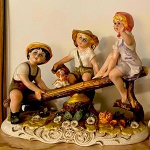 Gorgeous Large Capodimonte Porcelain
Figurine "3 Children on a See-saw" Italy